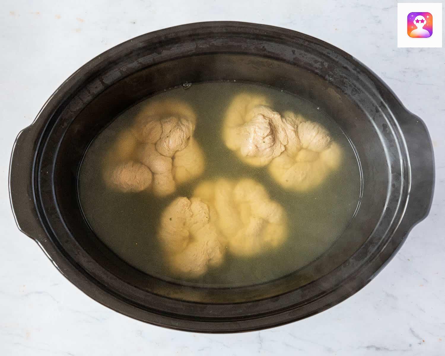 Adding to slow cooker.