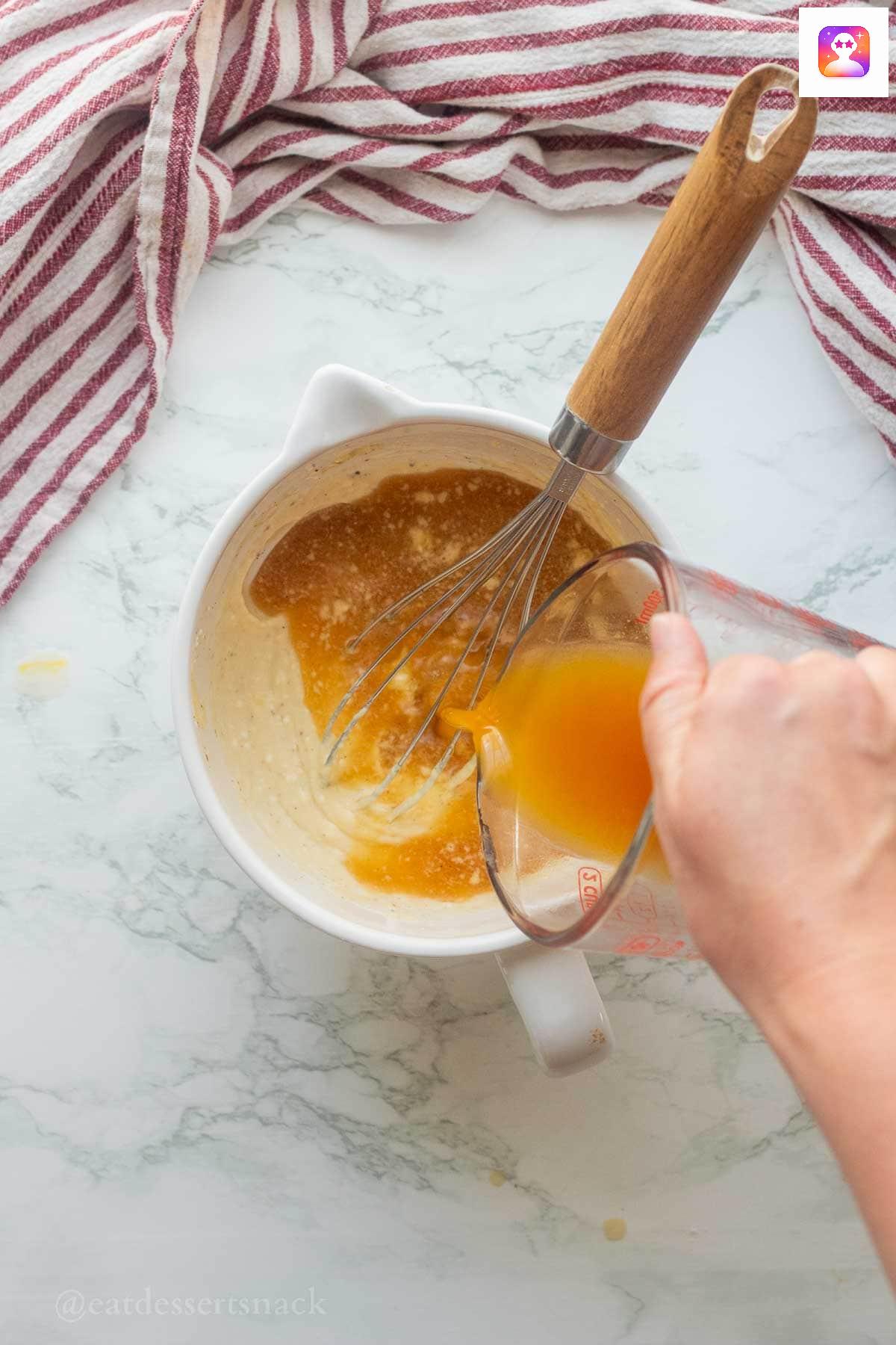 Mixing wet ingredients.